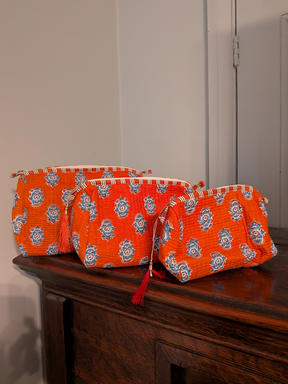 NWOT Orange Floral Quilted Cosmetic Bag Set - 3 Pack